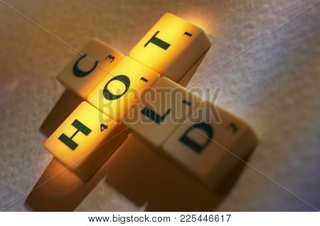 Cleckheaton, West Yorkshire, Uk: Scrabble Board Game Letters Spelling The Words Hot Cold, 1st June 2