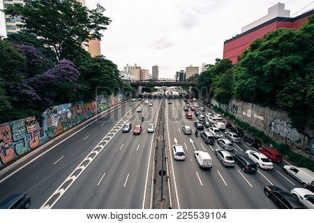 SAO PAULO, BRAZIL - FEBRUARY 02: Horizontal picture of the traffic in a large avenue in Liberdade, t