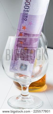 Glass Of Alcohol And Euro Note Cash Money
