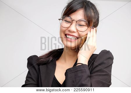 Business Women Talking With Smartphone Wear Suit And Gogles