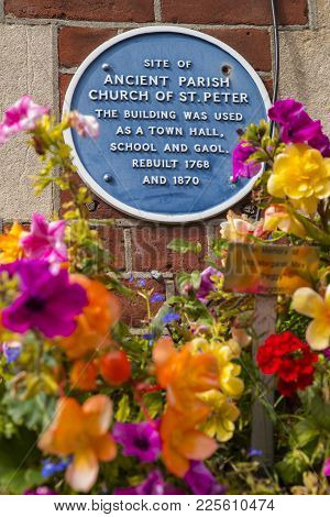 Dorset, Uk - August 16th 2017: A Blue Plaque Marking The Location Of The Ancient Parish Church Of St