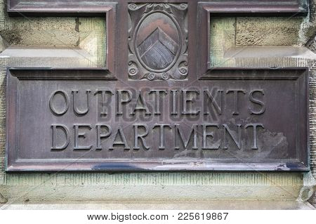 London, Uk - August 11th 2017: A Metal Plaque At The Outpatients Department At St. Bartholomews Hosp