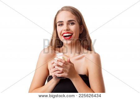 Portrait Of An Pretty Girl Holding A Cup Of Marshmallow And Looking At Camera Isolated Over White Ba