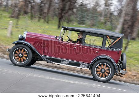 Adelaide, Australia - September 25, 2016: Vintage 1928 Oldsmobile F28 Tourer Driving On Country Road