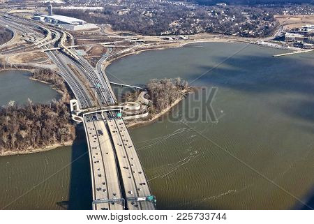 Flying Over A Bridge Crossing The Potomac River In Alexandria, Virginia