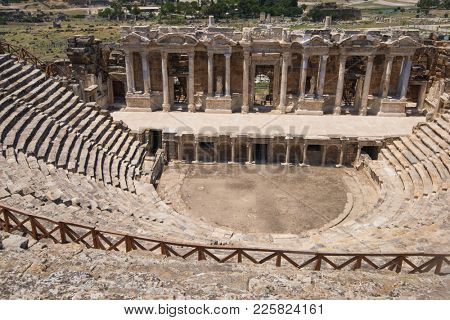 Roman amphitheatre in the ruins of Hierapolis, in Pamukkale, near modern turkey city Denizli, Turkey.