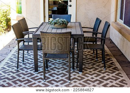 Outside Patio Table And Chairs On Carpet