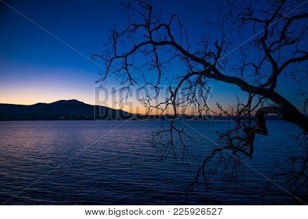 View of Nanaimo bay and skyline at dusk, taken from  Jack Point and Biggs Park in Nanaimo, British Columbia.