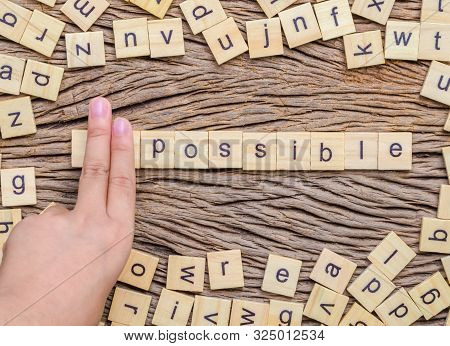 Possible Word Written Cube On Wooden Background. Vintage Concept.