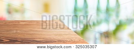 Wood Table Top Product Display Background With Blur People In Green Cafe Restaurant.left Perspective