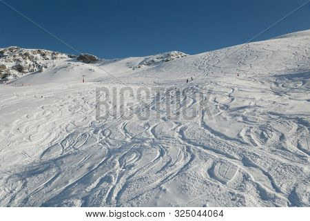 Ski slope with fresh snow curves