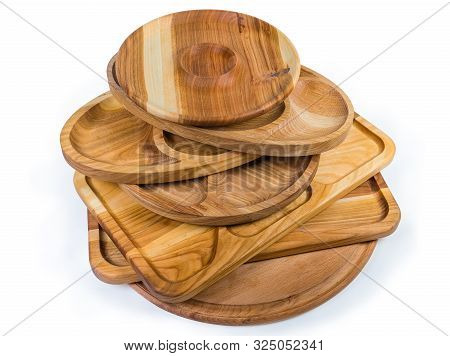Stack Of The Different Compartmental Dishes And Serving Boards Various Shapes Made With Hardwood On 