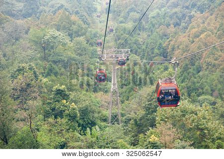 Qingchengshan, Sichuan Province, China - Sept 26, 2019 : Chinese Tourists In Cable Car In Qingcheng 