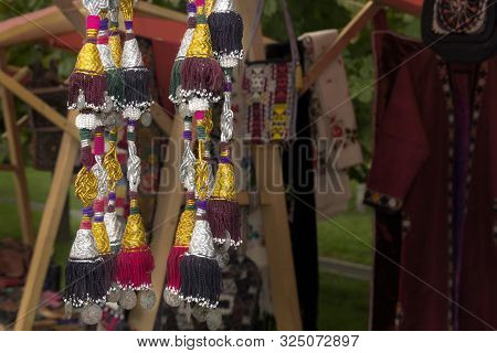 Kazakh Traditional Amulets Of The Old Thread And Silver Coins - Umit. Close-up