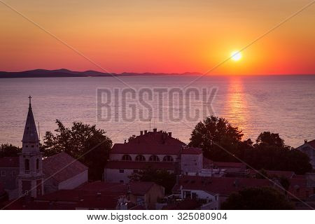 Beautiful Sunset On The Adriatic Sea At The Croatian Town Of Zadar, Europe.