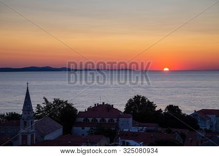 Beautiful Sunset On The Adriatic Sea At The Croatian Town Of Zadar, Europe.