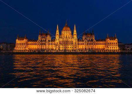 The Hungarian Parliament Building, A Notable Landmark Of Hungary In Budapest. View Of The Main Facad