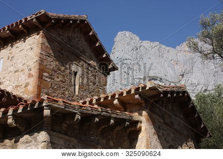 Pre-romanesque Church Of Santa María De Lebeña. In The Peaks Of Europe. North Of Spain. It Has A Leg