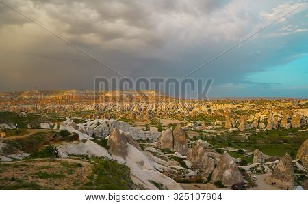 Sunset Panoramic View To Goreme City And Red, Rose And Meskendir Valleys Cappadocia, Turkey