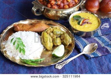 Dishes Of National Indian Cuisine On A Dark Blue Background. Traditional Indian Home-cooked Dinner. 