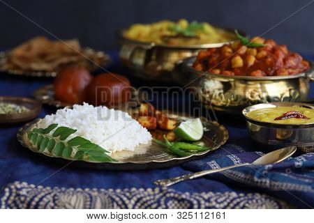 Indian Gastronomic Tourism. Abundance Of National Indian Cuisine On A Dark Blue Background. Dinner I