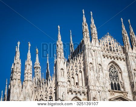 Ornate Facade Of Milan Catehdral In Italy