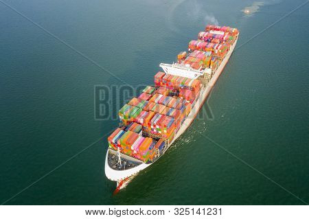 Aerial View Of The Large Volume Of Teu Container On Ship Sailing To The Sea Carriage The Shipment Fr