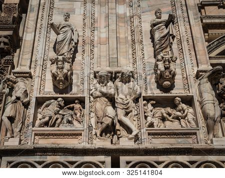 Ornate Facade Of Milan Catehdral In Italy