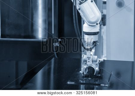 The Robotic Arm Handling The Aluminium Casting Parts To The Cleaning Process. The Ho Technology Auto