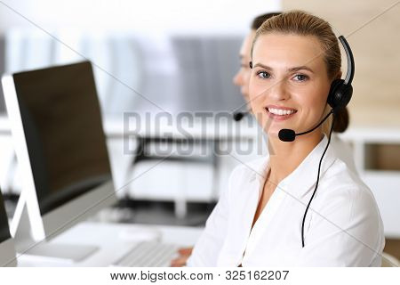Call Center. Happy And Excited Business Woman Using Headset While Consulting Clients Online. Custome