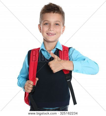 Happy Boy In School Uniform On White Background