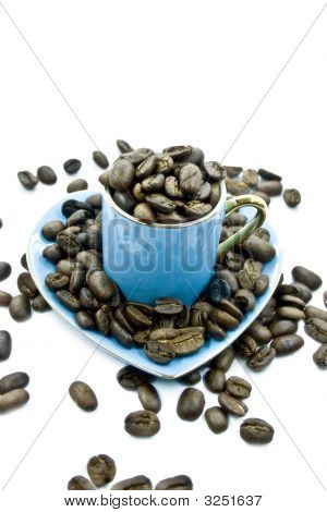 Una taza con semillas de café 1