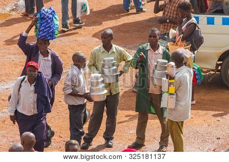 Kampala, Uganda - October 03, 2012.  Men Working In The Taxi Park In Kampala, Uganda On October 03,2