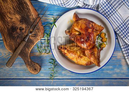 Chicken Quarters Baked On Plate. Top View.