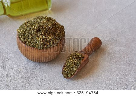 Mixed Spice Zaatar Or Zatar In Wooden Bowl On Stone Background