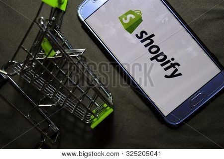 Bekasi, West Java, Indonesia. October 2, 2019 : Shopify Dev App On Smartphone Screen. Shopify Is A F