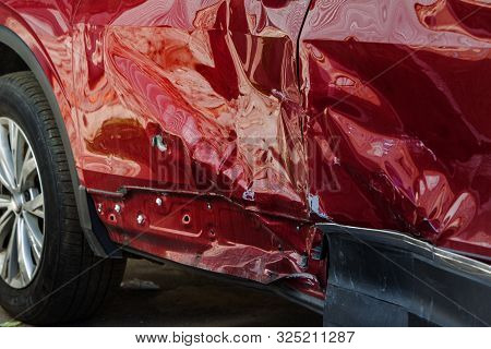 The Body Of The Car Is Damaged As A Result Of An Accident. High Speed Head On A Car  Traffic Acciden