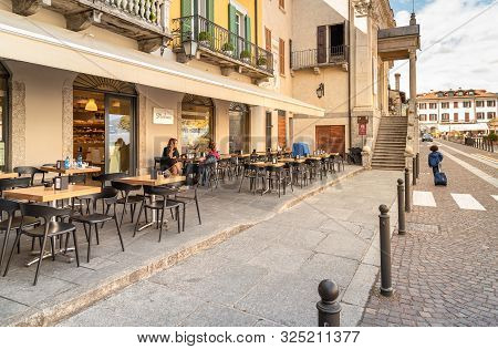 View Of Central Square - Piazza Del Popolo In Center Of Arona, Located On The Shore Of Lake Maggiore