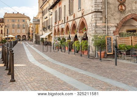 View Of Central Square - Piazza Del Popolo In Center Of Arona, Located On The Shore Of Lake Maggiore