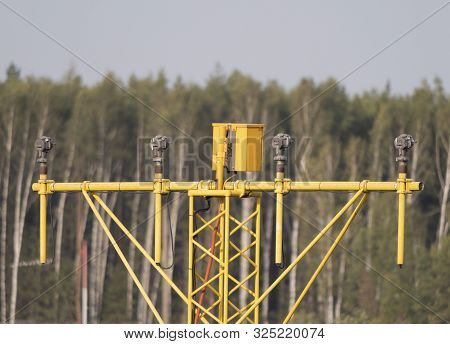 Yellow Metal Support Systems Of Care During Takeoff And Landing Direction Light Near Runway