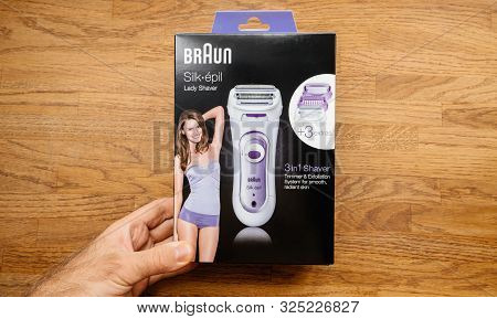 Paris, France - Sep 23, 2019: Pov Man Hand New Braun Silk Epil Women Lady Shaver Epilator 3 In 1 Tri