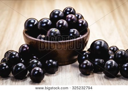 Fruit Called Jaboticaba Or Jabuticaba In A Basket On A White Background, Preserves Organic And Healt