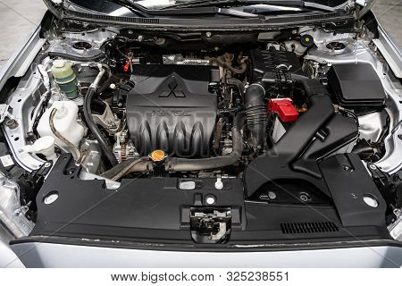 Novosibirsk, Russia - September 07, 2019:  Mitsubishi  Lanser, Close Up Detail Of  Car Engine, Front