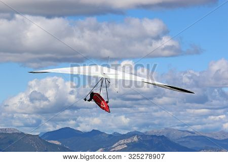 Hang Glider Flying From The Chabre Mountain, France