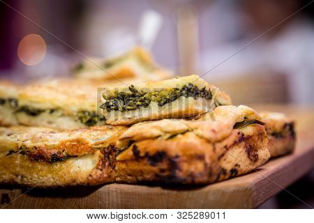 Little Stuffed Pizza With Pork Sausages And Friarielli Broccoli, Typical Neapolitan Food