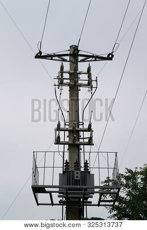 Outdoor Power Transformer Step Down To Mains 240v Mounted On Concrete Mast