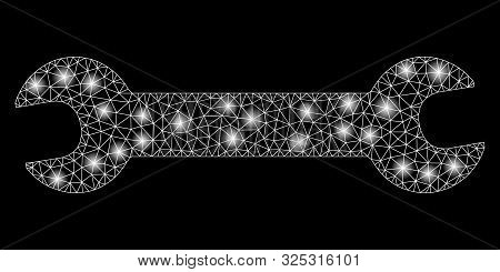 Glowing Mesh Wrench With Sparkle Effect. Abstract Illuminated Model Of Wrench Icon. Shiny Wire Carca