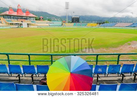 Colorful Umbrella On The Seats Of Dharamshala Himachal Cricket Stadium