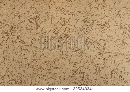 Fragment Of Wall, Beige With Brown Plaster. Finishing With Scratching Effect.