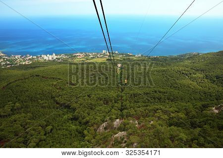 View From Ai-petri Mountain To The Cableway Station Of Coastal Village Koreiz. The Weather Is Clear.